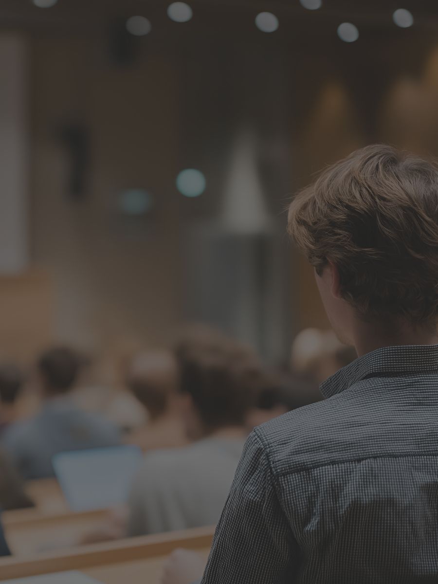 Student attending a classroom lecture